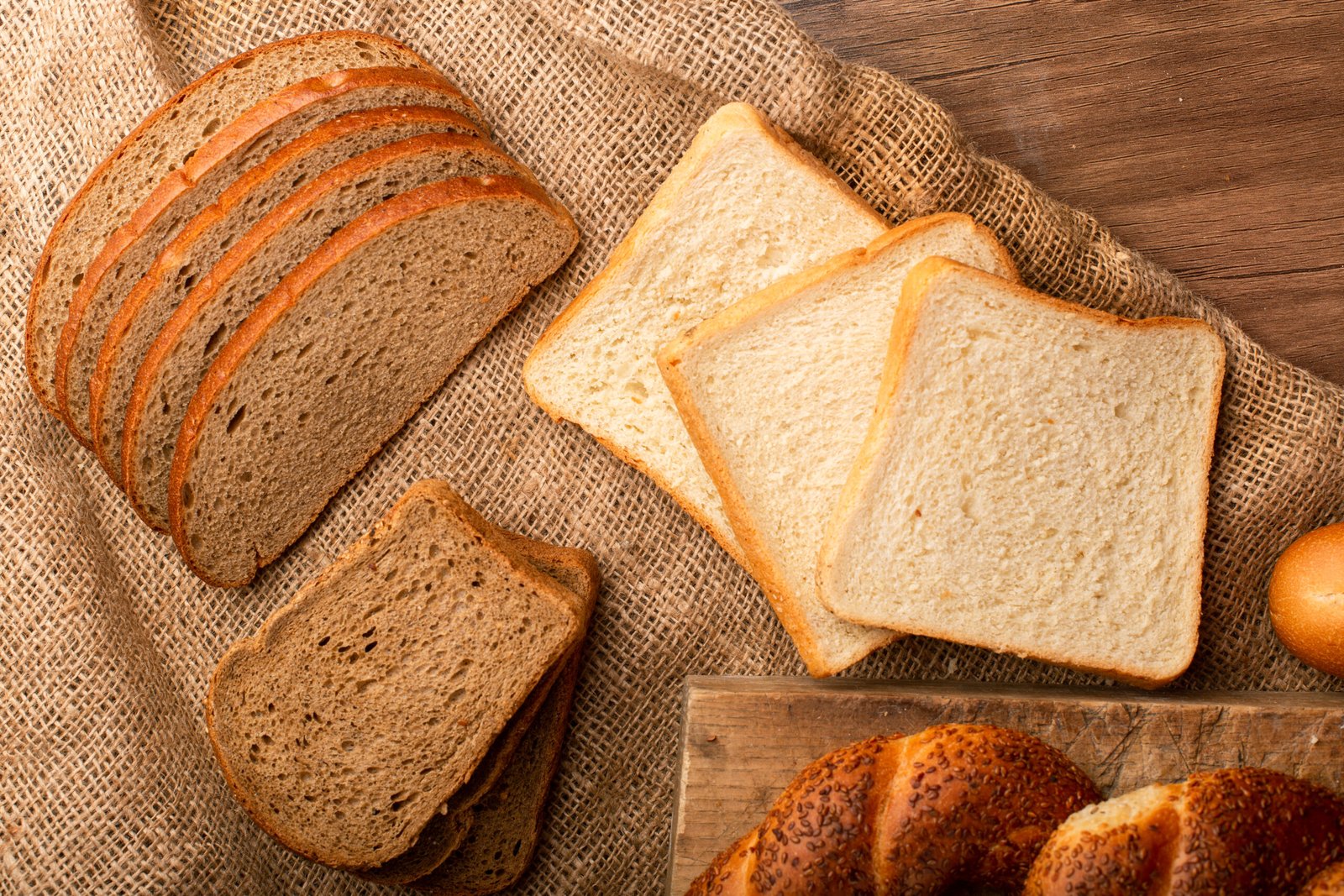 slices of white and brown bread with turkish bagels slices of white and brown bread with turkish bagels