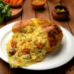 khan pilav with various fruits inside